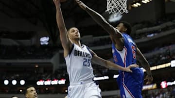 Feb 9, 2015; Dallas, TX, USA; Dallas Mavericks forward Chandler Parsons (25) shoots in the first quarter against Los Angeles Clippers center DeAndre Jordan (6) at American Airlines Center. Mandatory Credit: Matthew Emmons-USA TODAY Sports