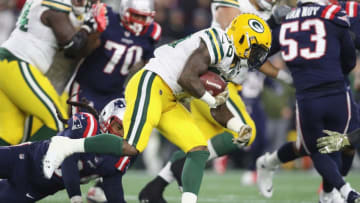 FOXBOROUGH, MA - NOVEMBER 04: Jamaal Williams #30 of the Green Bay Packers carries the ball during the second half against the New England Patriots at Gillette Stadium on November 4, 2018 in Foxborough, Massachusetts. (Photo by Maddie Meyer/Getty Images)