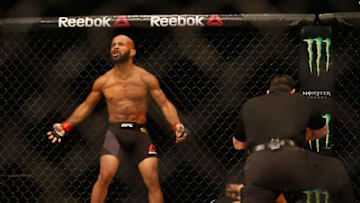 LAS VEGAS, NV - APRIL 23: Demetrious Johnson celebrates his TKO victory over Henry Cejudo in their flyweight championship bout during the UFC 197 event inside MGM Grand Garden Arena on April 23, 2016 in Las Vegas, Nevada. (Photo by Christian Petersen/Zuffa LLC/Zuffa LLC via Getty Images)