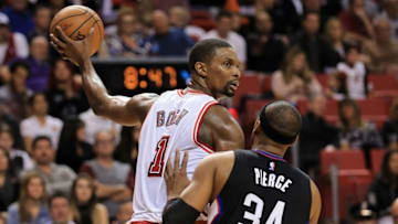 Feb 7, 2016; Miami, FL, USA; Miami Heat forward Chris Bosh (1) is pressured by Los Angeles Clippers forward Paul Pierce (34) during the second half at American Airlines Arena. The Clippers won 100-93. Mandatory Credit: Steve Mitchell-USA TODAY Sports