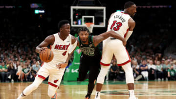 Victor Oladipo #4 of the Miami Heat dribbles past Marcus Smart #36 of the Boston Celtics (Photo by Maddie Meyer/Getty Images)