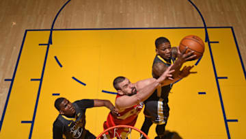 Former Golden State Warriors small forward Alfonzo McKinnie goes up for a rebound. (Photo by Garrett Ellwood/NBAE via Getty Images)