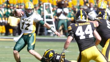 IOWA CITY, IOWA- SEPTEMBER 17: Defensive end Anthony Nelson #98 of the Iowa Hawkeyes grabs the ankle of quarterback Easton Stick #12 of the North Dakota State Bisons in the second quarter, on September 17, 2016 at Kinnick Stadium in Iowa City, Iowa. (Photo by Matthew Holst/Getty Images)