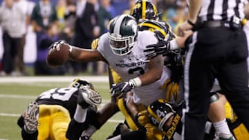 INDIANAPOLIS, IN - DECEMBER 05: LJ Scott #3 of the Michigan State Spartans reaches into the end zone against the Iowa Hawkeyes in the Big Ten Championship at Lucas Oil Stadium on December 5, 2015 in Indianapolis, Indiana. (Photo by Joe Robbins/Getty Images)