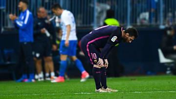 MALAGA, SPAIN - APRIL 08: Lionel Messi of FC Barcelona looks on dejected after Jony Rodriguez of Malaga CF scored his team's second goal during the La Liga match between Malaga CF and FC Barcelona at La Rosaleda stadium on April 8, 2017 in Malaga, Spain. (Photo by David Ramos/Getty Images)