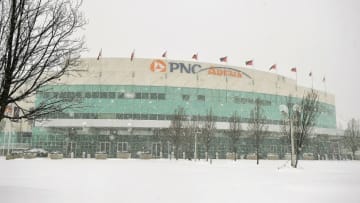 RALEIGH, NC - FEBRUARY 12: Snow falls outside PNC Arena on February 12, 2014 in Raleigh, North Carolina. Motorists were encouraged to stay off roads after Gov. Pat McCrory declared a state of emergency yesterday ahead of the winter storm. (Photo by Lance King/Getty Images)