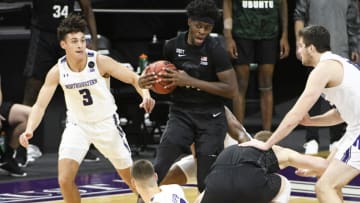 Dec 20, 2020; Evanston, Illinois, USA; Michigan State Spartans forward Gabe Brown (44) is defended by Northwestern Wildcats guard Ty Berry (3) during the second half at Welsh-Ryan Arena. Mandatory Credit: David Banks-USA TODAY Sports