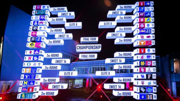 The bracket for women's basketball teams is seen on a television screen at a NCAA Tournament Selection Sunday watch party, Sunday, March 13, 2022, at Carver-Hawkeye Arena in Iowa City, Iowa.220313 Iowa Wbb Selection 009 Jpg