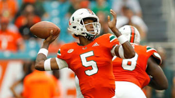 MIAMI GARDENS, FL - NOVEMBER 24: N'Kosi Perry #5 of the Miami Hurricanes throws a pass against the Pittsburgh Panthers during the first half at Hard Rock Stadium on November 24, 2018 in Miami Gardens, Florida. (Photo by Michael Reaves/Getty Images)