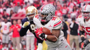 Jan 1, 2016; Glendale, AZ, USA; Ohio State Buckeyes running back Ezekiel Elliott (15) runs the ball against the Notre Dame Fighting Irish during the 2016 Fiesta Bowl at University of Phoenix Stadium. The Buckeyes defeated the Fighting Irish 44-28. Mandatory Credit: Mark J. Rebilas-USA TODAY Sports