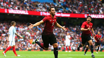 MANCHESTER, ENGLAND - MAY 22: Hakan Calhanoglu of Turkey celebrates after scoring his team's first goal during the International Friendly match between England and Turkey at Etihad Stadium on May 22, 2016 in Manchester, England. (Photo by Alex Livesey/Getty Images)