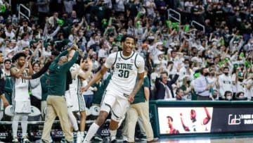 Michigan State forward Marcus Bingham Jr. (30) celebrates a play in the 68-65 upset of Purdue during the second half at the Breslin Center in East Lansing on Saturday, Feb. 26, 2022.