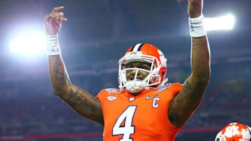 December 31, 2016; Glendale, AZ, USA; Clemson Tigers quarterback Deshaun Watson (4) celebrates a touchdown against the Ohio State Buckeyes in the the 2016 CFP semifinal at University of Phoenix Stadium. Mandatory Credit: Mark J. Rebilas-USA TODAY Sports