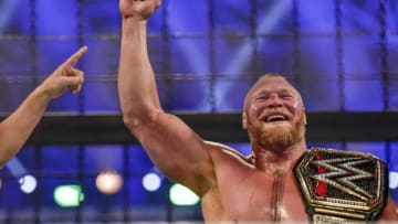 Brock Lesnar is declared champion following the 2022 World Wrestling Entertainment (WWE) Elimination Chamber at the Jeddah Super Dome in Saudi Arabia's Red Sea coastal city of Jeddah on February 19, 2022. (Photo by Amer HILABI / AFP) (Photo by AMER HILABI/AFP via Getty Images)