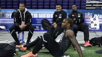 INDIANAPOLIS, IN - FEBRUARY 27: Wide receiver Henry Ruggs III of Alabama talks to quarterback Tua Tagovailoa of Alabama and wide receiver Lynn Bowden Jr. of Kentucky during the NFL Scouting Combine at Lucas Oil Stadium on February 27, 2020 in Indianapolis, Indiana. (Photo by Joe Robbins/Getty Images)