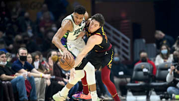 CLEVELAND, OHIO - JANUARY 26: Cedi Osman #16 of the Cleveland Cavaliers guards Giannis Antetokounmpo #34 of the Milwaukee Bucks during the second quarter at Rocket Mortgage Fieldhouse on January 26, 2022 in Cleveland, Ohio. NOTE TO USER: User expressly acknowledges and agrees that, by downloading and/or using this photograph, user is consenting to the terms and conditions of the Getty Images License Agreement. (Photo by Jason Miller/Getty Images)
