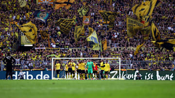 DORTMUND, GERMANY - OCTOBER 06: Borussia Dortmund players and fans celebrate after their team's victory during the Bundesliga match between Borussia Dortmund and FC Augsburg at Signal Iduna Park on October 6, 2018 in Dortmund, Germany. (Photo by Lars Baron/Bongarts/Getty Images)