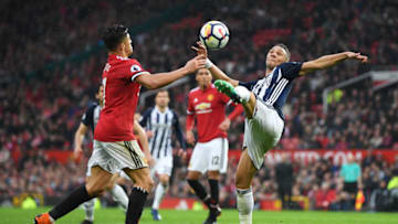 MANCHESTER, ENGLAND - APRIL 15: Kieran Gibbs of West Bromwich Albion and Alexis Sanchez of Manchester United in action during the Premier League match between Manchester United and West Bromwich Albion at Old Trafford on April 15, 2018 in Manchester, England. (Photo by Shaun Botterill/Getty Images)