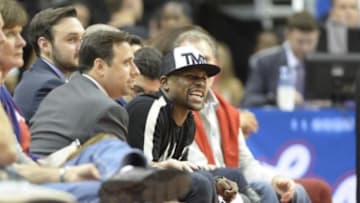Oct 23, 2013; Los Angeles, CA, USA; Professional boxer Floyd Mayweather watches from courtside during the game between the Los Angeles Clippers and the Utah Jazz at Staples Center. Mandatory Credit: Richard Mackson-USA TODAY Sports
