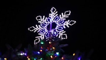 Santa Claus, carriage rides, and downtown shops were available for the annual Downton Holiday Open House with no tree lighting ceremony and a small number of people due to the coronavirus pandemic on Nov. 20, 2020.Holiday 40a8004