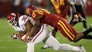 Nov 3, 2016; Ames, IA, USA; Iowa State Cyclones defensive back Jomal Wiltz (17) tackles Oklahoma Sooners fullback Dimitri Flowers (36) at Jack Trice Stadium. Mandatory Credit: Reese Strickland-USA TODAY Sports