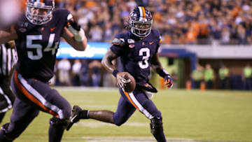CHARLOTTESVILLE, VA - SEPTEMBER 14: Bryce Perkins #3 of the Virginia Cavaliers rushes into the end zone for a two-point conversion in the second half during a game against the Florida State Seminoles at Scott Stadium on September 14, 2019 in Charlottesville, Virginia. (Photo by Ryan M. Kelly/Getty Images)