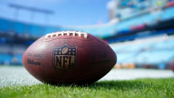 CHARLOTTE, NORTH CAROLINA - NOVEMBER 17: An NFL football with logo before the game between the Carolina Panthers and the Atlanta Falcons at Bank of America Stadium on November 17, 2019 in Charlotte, North Carolina. (Photo by Jacob Kupferman/Getty Images)