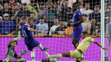 LAS VEGAS, NEVADA - JULY 16: Timo Werner #11 of Chelsea scores a goal against goaltender Óscar Jiménez #27 and Sebastián Cáceres #4 of Club América as Michy Batshuayi #30 of Chelsea looks on during their preseason friendly match at Allegiant Stadium on July 16, 2022 in Las Vegas, Nevada. Chelsea defeated Club América 2-1. (Photo by Ethan Miller/Getty Images)