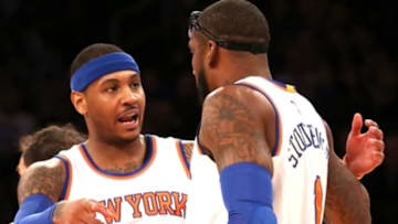 Jan 19, 2015; New York, NY, USA; New York Knicks forward Carmelo Anthony (7) talks to teammate center Amar