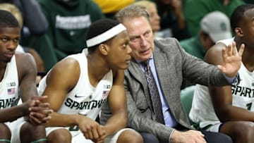 Jan 4, 2017; East Lansing, MI, USA; Michigan State Spartans head coach Tom Izzo talks to Spartans guard Cassius Winston (5) during the first half of a game at the Jack Breslin Student Events Center. Mandatory Credit: Mike Carter-USA TODAY Sports