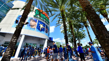 ST PETERSBURG, FLORIDA - MARCH 28: Fans line up outside of Tropicana field during Opening Day before a baseball game between the Tampa Bay Rays and the Houston Astros on March 28, 2019 in St Petersburg, Florida. (Photo by Julio Aguilar/Getty Images)