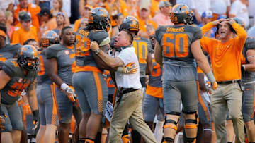 Sep 24, 2016; Knoxville, TN, USA; Tennessee Volunteers head coach Butch Jones and defensive lineman Kendal Vickers (39) during the second half against the Florida Gators at Neyland Stadium. Tennessee won 38-28. Mandatory Credit: Randy Sartin-USA TODAY Sports