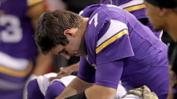 Nov 7, 2013; Minneapolis, MN, USA; Minnesota Vikings quarterback Christian Ponder (7) looks down during the second quarter against the Washington Redskins at Mall of America Field at H.H.H. Metrodome. Mandatory Credit: Brace Hemmelgarn-USA TODAY Sports