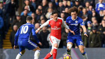 LONDON, ENGLAND - FEBRUARY 04: David Luiz of Chelsea battles for the ball with Mesut Oezil of Arsenal during the Premier League match between Chelsea and Arsenal at Stamford Bridge on February 4, 2017 in London, England. (Photo by Darren Walsh/Chelsea FC via Getty Images)
