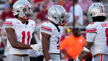 Sep 2, 2023; Bloomington, Indiana, USA; Ohio State Buckeyes linebacker C.J. Hicks (11), cornerback Davison Igbinosun (1) and safety Lathan Ransom (8) line up during the NCAA football game at Indiana University Memorial Stadium. Ohio State won 23-3.