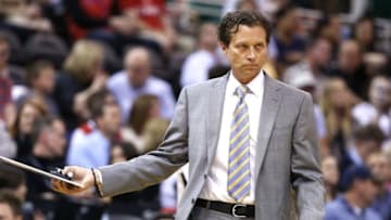 Apr 8, 2016; Salt Lake City, UT, USA; Utah Jazz head coach Quin Snyder grabs his clipboard during a timeout against the Los Angeles Clippers at Vivint Smart Home Arena. Mandatory Credit: Jeff Swinger-USA TODAY Sports