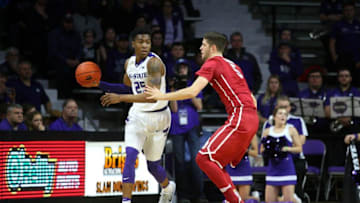 Jan 7, 2017; Manhattan, KS, USA; Kansas State Wildcats guard Wesley Iwundu (25) is guarded by Oklahoma Sooners forward Matt Freeman (5) during a game at Fred Bramlage Coliseum. The Wildcats won the game, 75-64. Mandatory Credit: Scott Sewell-USA TODAY Sports