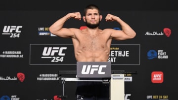 ABU DHABI, UNITED ARAB EMIRATES - OCTOBER 23: In this handout image provided by UFC, Khabib Nurmagomedov of Russia poses on the scale during the UFC 254 weigh-in on October 23, 2020 on UFC Fight Island, Abu Dhabi, United Arab Emirates. (Photo by Josh Hedges/Zuffa LLC via Getty Images)
