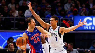 Detroit Pistons forward Bojan Bogdanovic (44) is defended by Dallas Mavericks center Dwight Powell Credit: Rick Osentoski-USA TODAY Sports