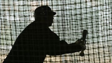 MESA, AZ - FEBRUARY 28: Pitcher Carlos Zambrano #38 of the Chicago Cubs works in the batting cage during practice on February 28, 2004 at Fitch Park in Mesa, Arizona. (Photo by Brian Bahr/Getty Images)