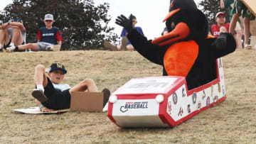 The Baltimore Orioles mascot cardboard sledding at the Little League World Series in South Williamsport, Pennsylvania, on Sunday, Aug. 21, 2022. The Red Sox and Baltimore Orioles played in the Little League Classic at Bowman Field on Sunday night.Classic