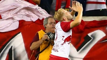 Jul 1, 2015; Harrison, NJ, USA; New York Red Bulls midfielder Mike Grella (13) reacts after scoring a second half goal against the New York Cosmos during the U.S. Open Cup match at Red Bull Arena. The Red Bulls defeated the Cosmos 4-1. Mandatory Credit: Andy Marlin-USA TODAY Sports