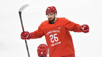 Russia's Vyacheslav Voinov is congratulated by teammate Vladislav Gavrikovr after scoring in the men's gold medal ice hockey match between the Olympic Athletes from Russia and Germany during the Pyeongchang 2018 Winter Olympic Games at the Gangneung Hockey Centre in Gangneung on February 25, 2018. / AFP PHOTO / Kirill KUDRYAVTSEV (Photo credit should read KIRILL KUDRYAVTSEV/AFP/Getty Images)