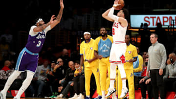 LOS ANGELES, CALIFORNIA - NOVEMBER 15: Zach LaVine #8 of the Chicago Bulls shoots a three-point basket against Anthony Davis #3 of the Los Angeles Lakers during the first quarter at Staples Center on November 15, 2021 in Los Angeles, California. NOTE TO USER: User expressly acknowledges and agrees that, by downloading and or using this photograph, User is consenting to the terms and conditions of the Getty Images License Agreement. (Photo by Katelyn Mulcahy/Getty Images)
