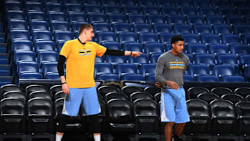 NEW ORLEANS, LA - APRIL 4: Nikola Jokic #15 and Gary Harris #14 of the Denver Nuggets stretch during practice on April 4, 2017 at the Smoothie King Center in New Orleans, Louisiana. NOTE TO USER: User expressly acknowledges and agrees that, by downloading and/or using this Photograph, user is consenting to the terms and conditions of the Getty Images License Agreement. Mandatory Copyright Notice: Copyright 2017 NBAE (Photo by Garrett W. Ellwood/NBAE via Getty Images)