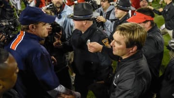 Nov 12, 2016; Athens, GA, USA; Georgia Bulldogs head coach Kirby Smart (right) and Auburn Tigers head coach Gus Malzahn (left) shake hands after the game at Sanford Stadium. Georgia defeated Auburn 13-7. Mandatory Credit: Dale Zanine-USA TODAY Sports