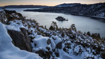 SOUTH LAKE TAHOE, CA - MARCH 3: A light coating of snow dusts the mountains around Emerald Bay following a fast-moving storm the day before as viewed on March 3, 2020, in South Lake Tahoe, California. After a series of heavy snowstorms in December, the moisture flowing off the Pacific Ocean and into the mountains disappeared in January and February leaving the annual snowpack at 50 percent of normal. (Photo by George Rose/Getty Images)