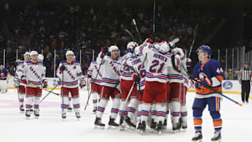 NEW YORK, NEW YORK - FEBRUARY 25: The New York Rangers celebrate their 4-3 overtime win against the New York Islanders at NYCB Live's Nassau Coliseum on February 25, 2020 in Uniondale, New York. (Photo by Bruce Bennett/Getty Images)