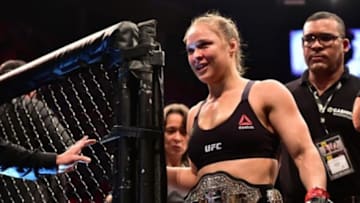 Aug 1, 2015; Rio de Janeiro, RJ, Brazil; Ronda Rousey (red gloves) celebrates after defeating Bethe Correia (not pictured) during UFC 190 at HSBC Arena. Mandatory Credit: Jason Silva-USA TODAY Sports