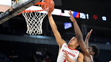 LAS VEGAS, NEVADA - NOVEMBER 22: Johnny Davis #1 of the Wisconsin Badgers shoots against Henry Coleman III #15 of the Texas A&M Aggies during the 2021 Maui Invitational basketball tournament at Michelob ULTRA Arena on November 22, 2021 in Las Vegas, Nevada. (Photo by David Becker/Getty Images)